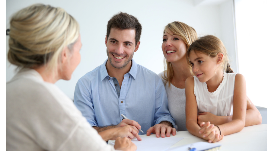 Young Family With Female Agent Shutterstock_167842049